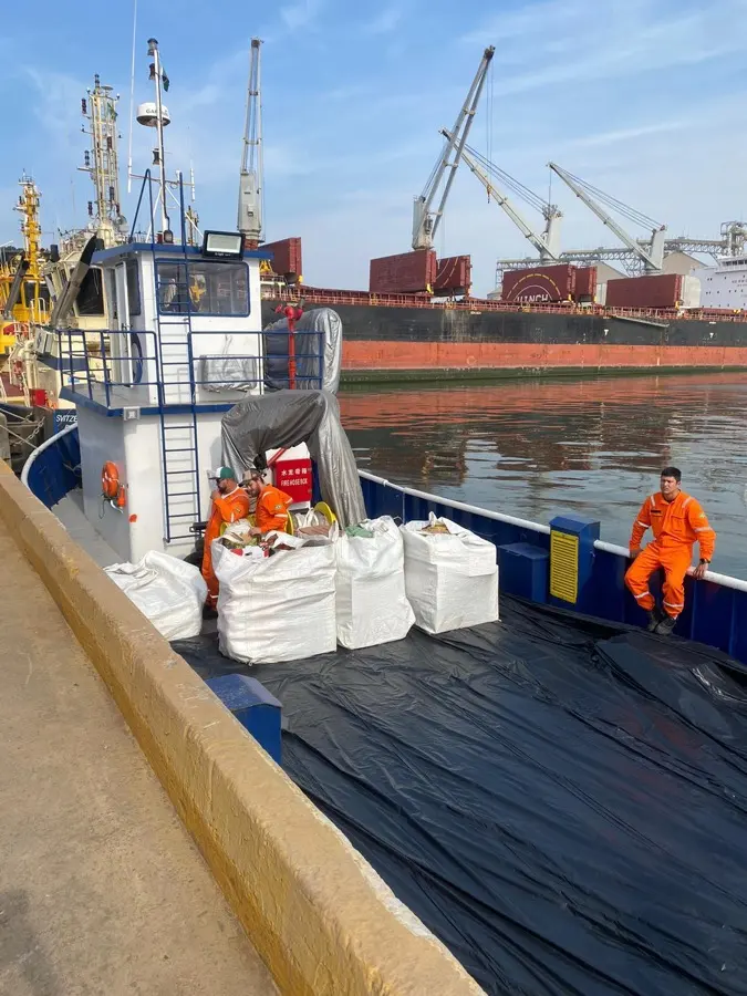Supplies heading out to the vessel by launch